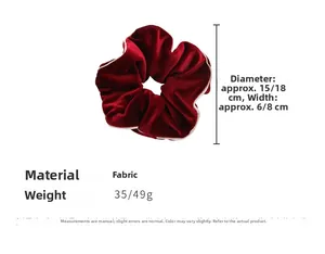 Détail d'un chouchou en velours rouge foncé avec liseré blanc, taille 15-18cm et largeur 6-8cm