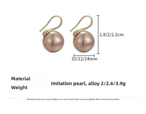 Vista detallada de los pendientes de perlas champán en tamaños 10mm, 12mm y 14mm con ganchos dorados