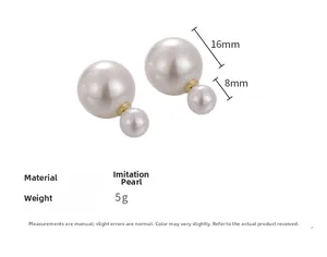 Detail of double-sided pearl earrings featuring 8mm and 16mm round pearls with gold plating