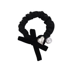 Velvet bow scrunchie with crystal heart and pearl detail for elegant hairstyles