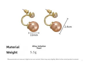 Detail view of champagne gold pearl earrings with C-shaped metal curve and dimensions
