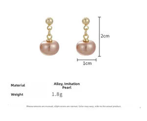 Detailed size specifications of champagne pearl drop earrings in 2cm by 1cm dimensions