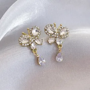 Elegant butterfly earrings with sparkling crystals and water drop tassel in gold finish