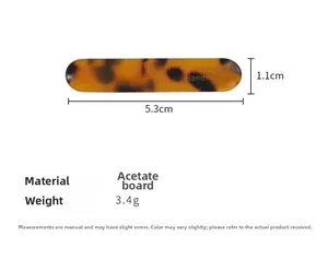 Detail showing acetate hair clip dimensions 5.3cm x 1.1cm and 3.4g weight in brown tortoiseshell