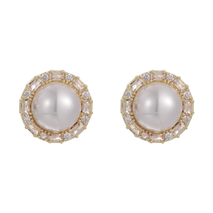 French vintage pearl and zircon stud earrings with gold setting on white background