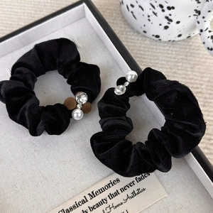 Elegant black velvet hair scrunchies set with faux pearls and crystals for women