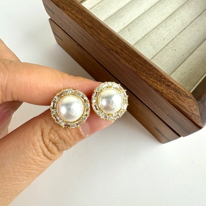 French vintage pearl stud earrings with zircon halo and gold metal base for women