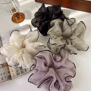 Elegant oversized chiffon scrunchies set with black trim in beige, black, purple, and gold