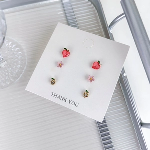 Pink cherry flower stud earring set featuring three pairs of cute floral and heart designs