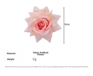 Detailed view of an 8cm pink fabric artificial rose hair clip with soft gradient petals