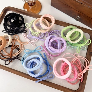 Set di elastici per capelli colorati e scrunchies con fiocco in tonalità caramella