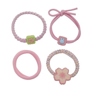 Pink elastic hair ties set with flower and rabbit charms in four different styles