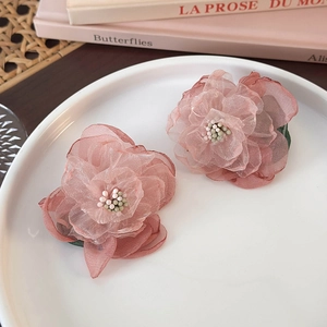 Handmade 3D mesh flower earrings with pink gradient petals and beaded center in a set