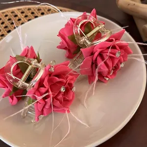 Elegant pink floral hair clips with soft feathers and rhinestones for styling