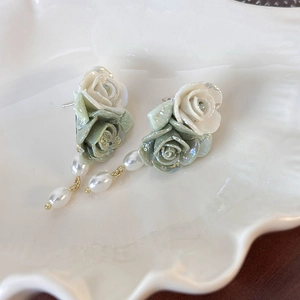 Vintage green ceramic rose and pearl earrings with elegant French style gold accents