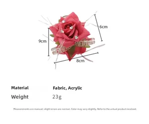 Detailed view of pink fabric rose hair claw clip with rhinestones, 9cm x 6cm x 8cm size