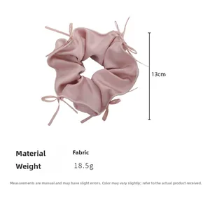 Elastico per capelli rosa con fiocchi, diametro 13 cm, vista dettagliata del tessuto
