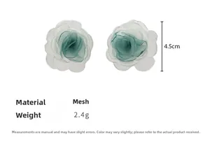 Detail of 4.5cm mesh flower earrings featuring layered gradient fabric and lightweight design