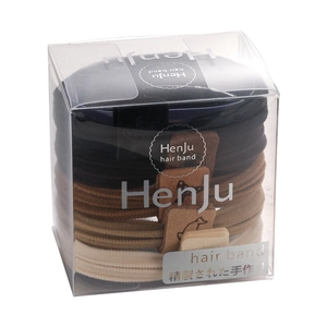 Set of 5 plush high-elastic hair ties in neutral colors within a square clear box