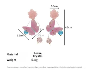 Detail view of pink flower butterfly earrings with crystal beads and size specifications