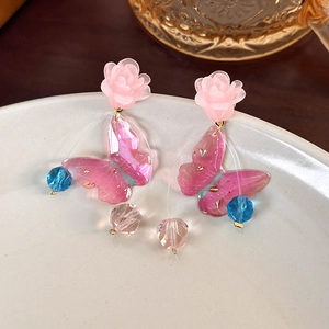 Pink floral crystal butterfly earrings with delicate tassels for a fairy-inspired look