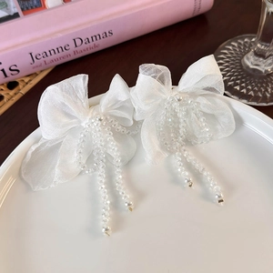 Elegant white chiffon bow earrings with crystal beads and tassel drop pearls