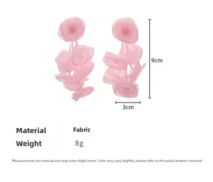 Close-up of pink fabric flower earrings with crystal beads and dimensional measurements