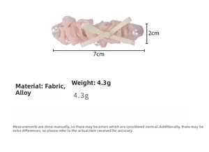 Vue détaillée des dimensions et du poids de la pince à cheveux rose avec perles