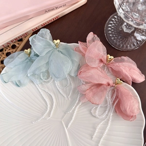 Elegant organza butterfly hair clips with pearl tassels and heart center in a set