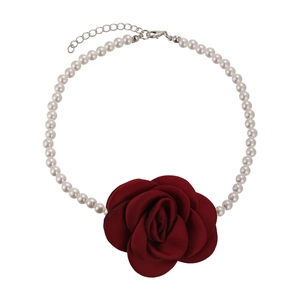 French vintage pearl necklace featuring a large dark red satin camellia flower charm