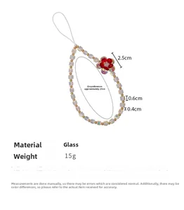 Detail of colorful glass square beads and red flower on a 27cm phone wrist strap