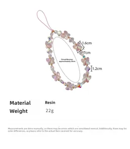 Close-up of colorful resin butterfly beads and iridescent beads for phone lanyard strap