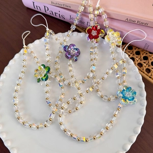 Colorful square glass bead phone charms with acrylic flowers and golden accents