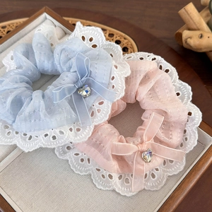 Elegant lace scrunchie set with ribbon bow and heart rhinestone detail in display box