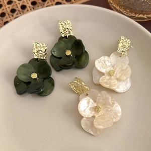French vintage floral earrings with moss green and pearly white acrylic petals and gold metal