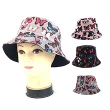 Detail view of double-sided bucket hat with butterfly print in various colors for sun protection