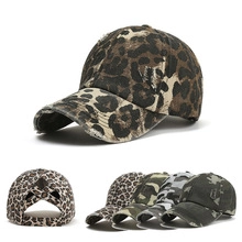Detail of cross elastic bands at the back of baseball cap for high ponytail comfort