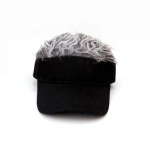 Detail view of hip hop camouflage baseball cap featuring creative grey faux hair wig on top