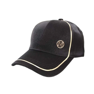 Satin-finish black baseball cap with gold M logo emblem and metallic trim accents