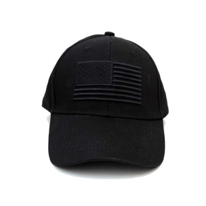 Detail of black baseball cap with tactical tonal US flag embroidery and cotton texture