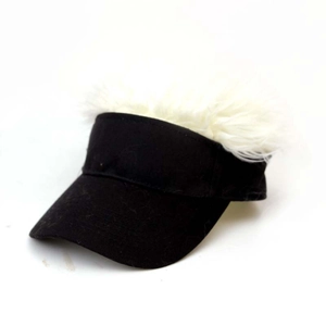 Macro view of novelty baseball cap with black fabric and white fuzzy wig hair top