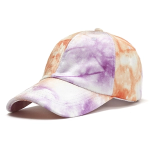 Tie-dye velvet baseball cap in purple and orange with a classic curved brim and six-panel crown