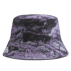 Detailed view of the purple and black tie-dye bucket hat with reinforced brim stitching