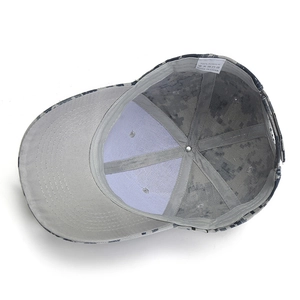 Structure interne de la casquette tactique camouflage montrant le bandeau et l'étiquette