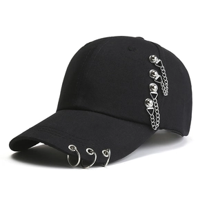 Close-up of black cotton baseball cap with silver metal rings and hanging chains