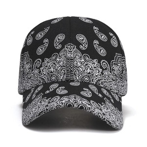 Unisex black baseball cap with white paisley patterns and ethnic tribal motifs