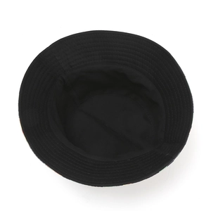 Banana print bucket hat with black inner lining and reinforced stitching for sun protection