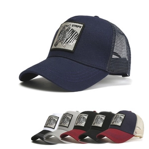 Detail of zebra stripe patch on cotton front and breathable mesh trucker cap