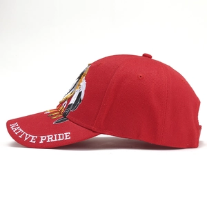 Unisex red cotton baseball cap with Native Pride embroidery and ethnic wolf portrait