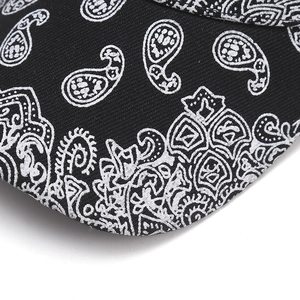 Fashionable black baseball cap with white paisley print detail for men and women